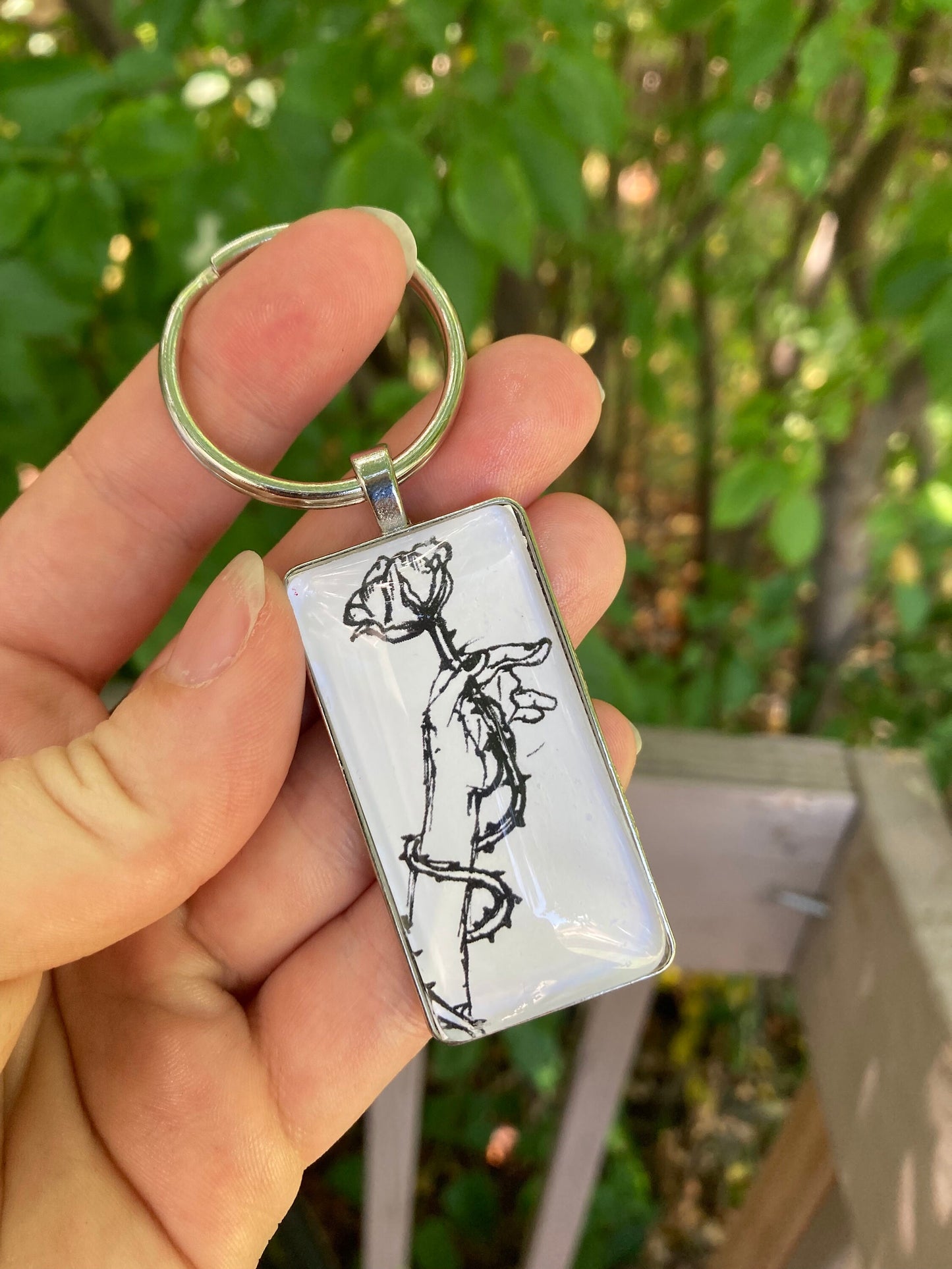 Hand with Rose Pendant